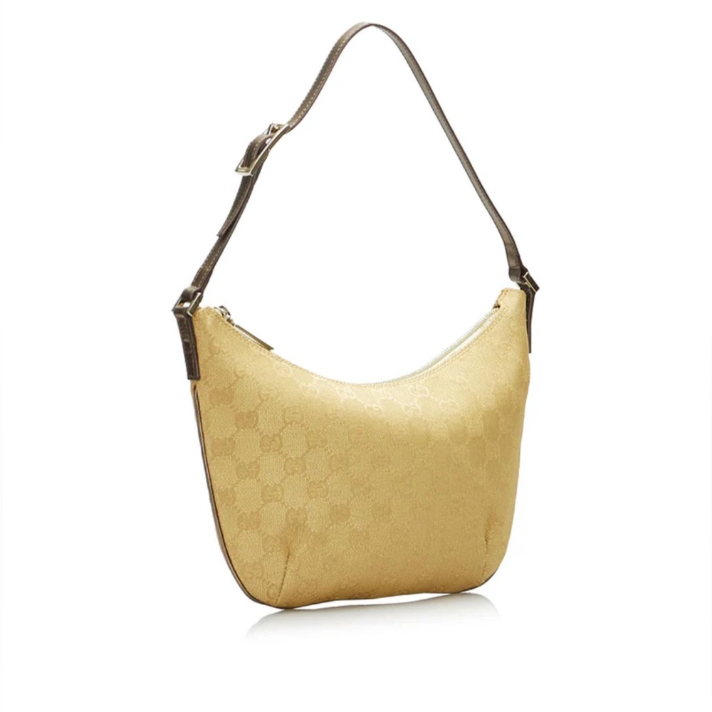 Gucci GG canvas gold shoulder baguette